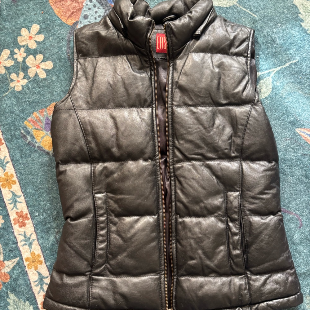 East side, black leather vest